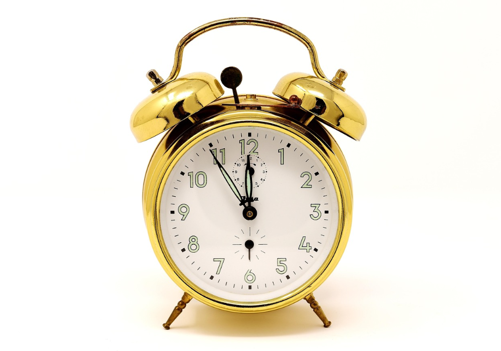 Retro style gold and white alarm clock